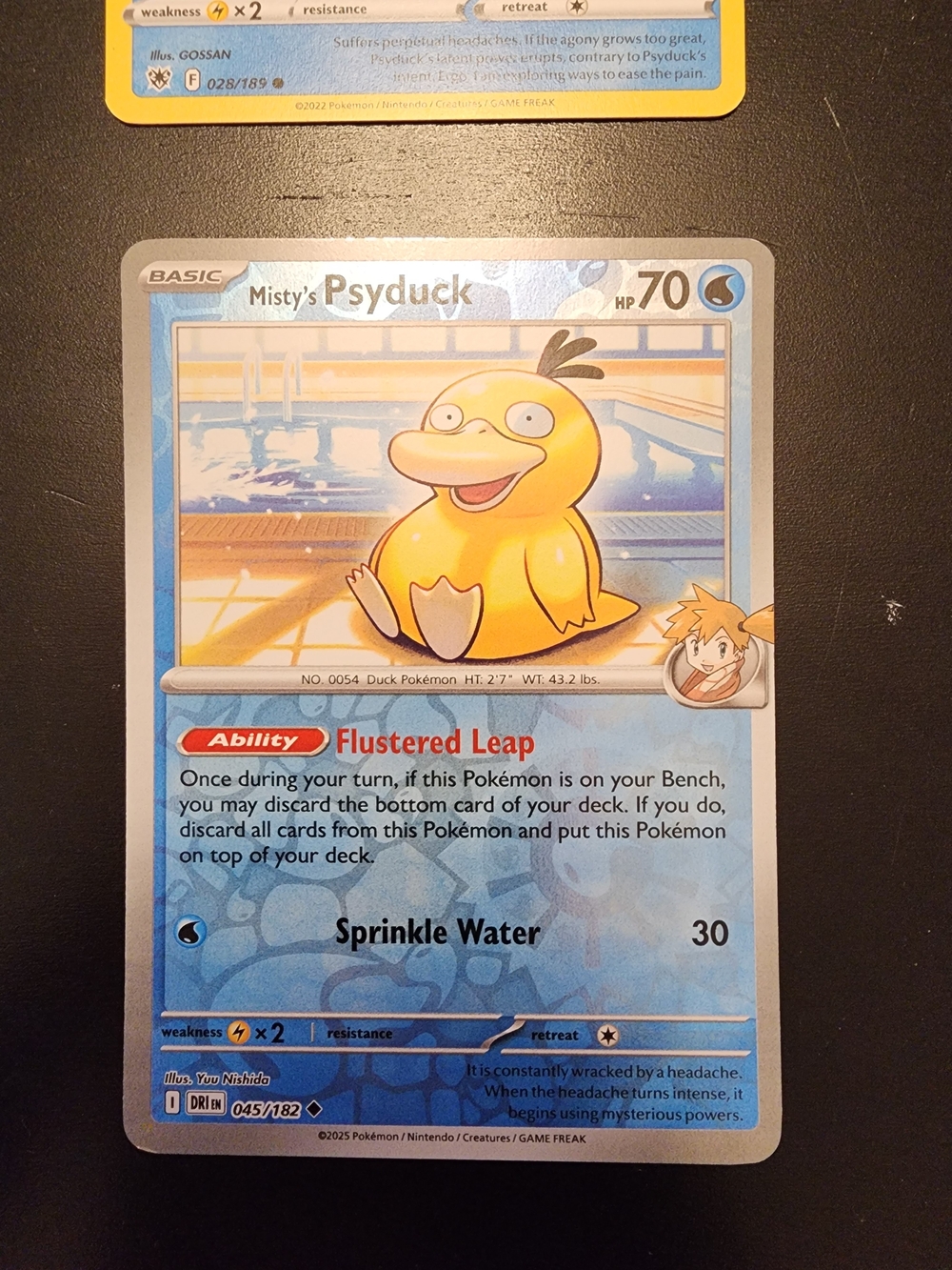 Misty’s Psyduck 045/182 Reverse Holo Pokémon Card
